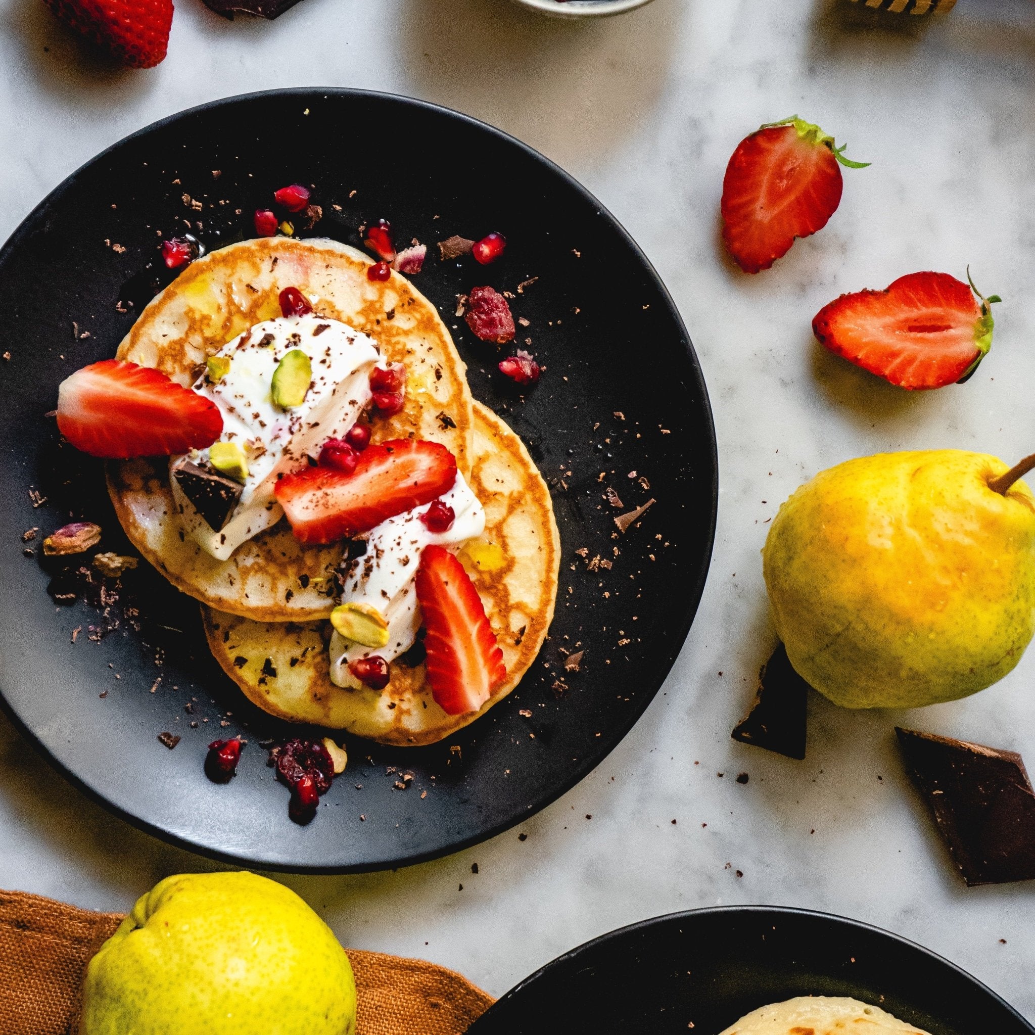 Healthy Strawberries & Cream Protein Pancakes - Lidia's